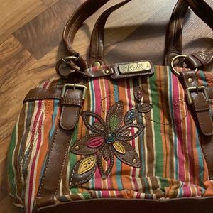 Women’s purse multi color with a flower